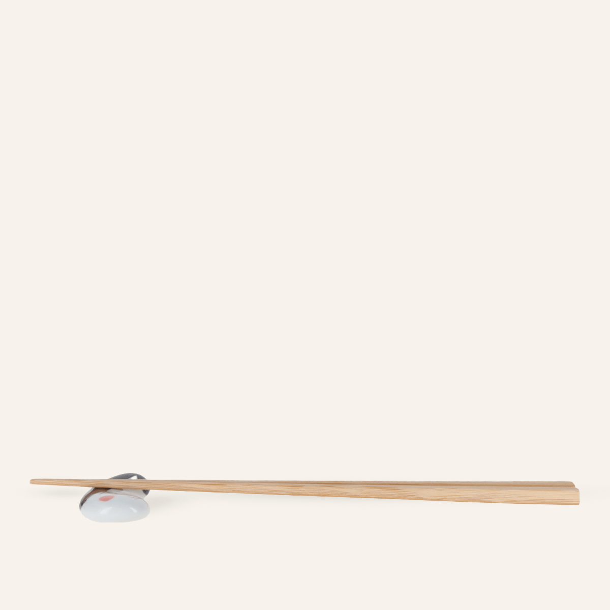 Hasamiyaki porcelain chopstick rest "Okame"