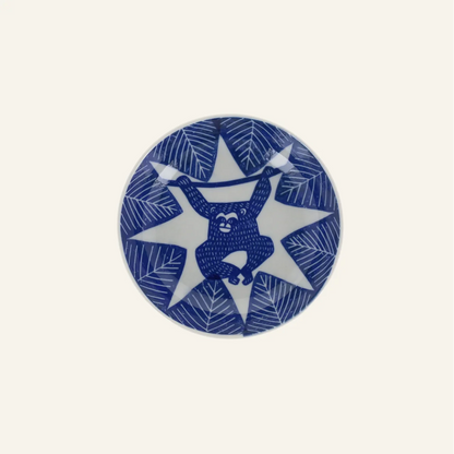 Petite assiette creuse en porcelaine motifs "Singe suspendu"